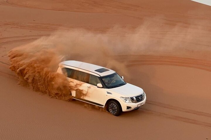 Experience the thrill of Dubai's golden dunes as you speed across the sandy landscape followed by a sumptuous BBQ dinner under the starlit sky making memories to cherish forever.